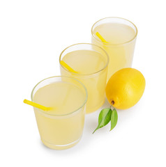 Glasses of cool tasty lemonade on white background