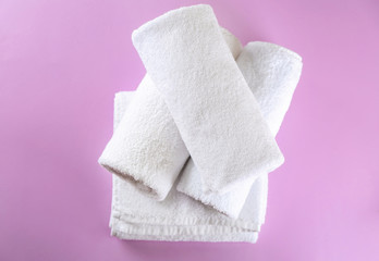 Fototapeta na wymiar Soft towels on color background