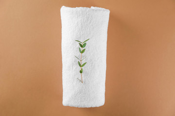 Soft towel on color background