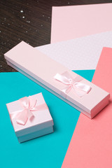 Wrapping presents. Gift boxes. Color paper for packaging.