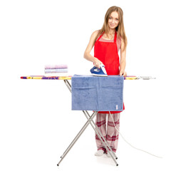 Fototapeta na wymiar Beautiful woman in apron stack towels clean ironing board iron on white background isolation