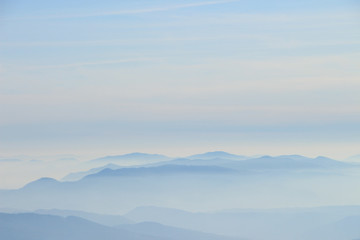 Panoramic view of beautiful landscape Carpathian mountains (Borzhava range) in haze