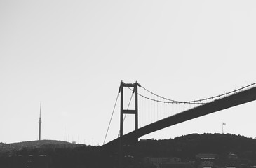 Fototapeta na wymiar Bosphorus black and white view of the Bridge in a sunny day on the Shore line of istanbul.