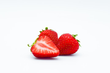 Strawberries cut isolated on white background, strawberry slice