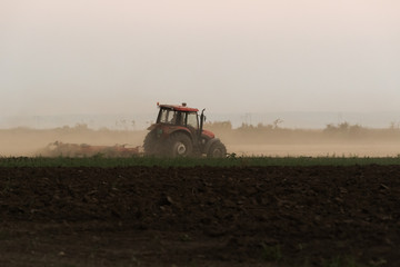 Fototapeta premium Plowing of stubble field