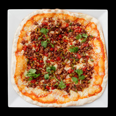 Pizza with duck meat and barbecue sauce on black background