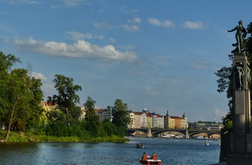 architecture,bank,blue,bohemia,building,cathedral,church,city,cityscape,cloud,czech,europe,evening,gothic,historical,holiday,house,landscape,old,outdoor,paul,peter,prague,praha,quay,river,riverscape,r