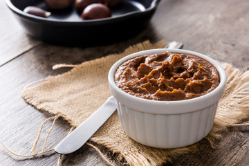 Chestnut cream on bowl rusty table