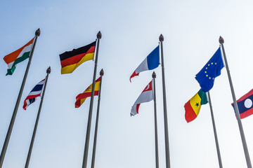 flags of different countries on white background of blue sky