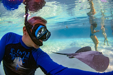 snorkeling in french polynesia with stingray