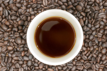 Coffee cup and coffee beans
