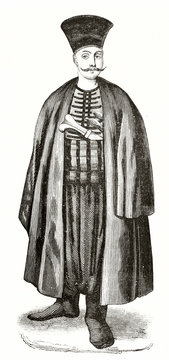 Engraved portrait of an ancient Armenian man in Constantinople with a long cloack and high hat. He also has long moustaches. By unidentified author published on Magasin Pittoresque Paris 1839
