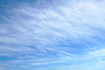 beautiful blue sky with soft cirrus clouds for background