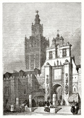 Ancient angle bottom view of Seville cathedral Spain in a black and white sunset atmosphere. By unidentified author published on Magasin Pittoresque Paris 1839