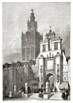Ancient angle bottom view of Seville cathedral Spain in a black and white sunset atmosphere. By unidentified author published on Magasin Pittoresque Paris 1839