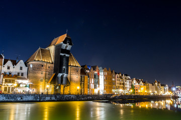 Historical buildings on the promenade of Gdansk at night. Poland © Shyshko Oleksandr
