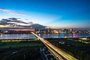 busy traffic road with city skyline