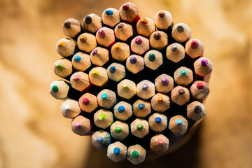 A bunch of pencils standig up