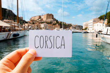 word Corsica in a signboard in Bonifacio, Corsica