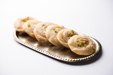 Chirote or Chiroti is a sweet dish from Karnataka and Maharashtra. Served in a plate as a dessert on Festivals or wedding. Selective focus