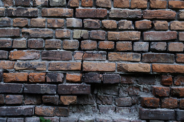 Old red brick wall background.