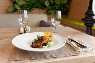 Fried duck dish on restaurant table