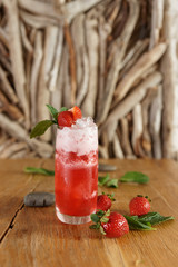 Strawberry cocktail on wooden table © Kondor83