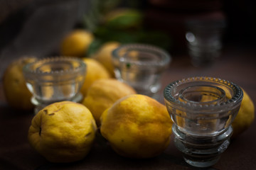 Quinces and glass containers