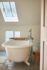 a vintage old bathroom with an ambiance bathroom vintage, white walls skylight