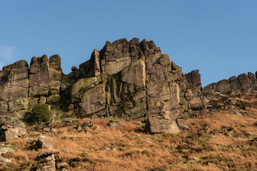 Hen Cloud against a beautiful blue sky at the Roaches, Staffordshire in the Peak District National park.