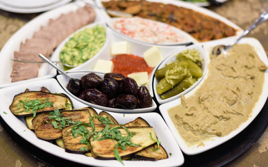 Mix of different snacks and appetizers.  Tapas bar.