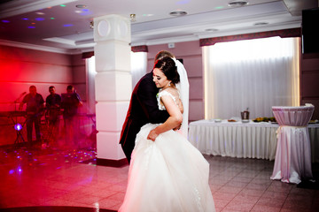 Pretty dance newlyweds on the dance floor