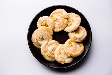 Chirote or Chiroti is a sweet dish from Karnataka and Maharashtra. Served in a plate as a dessert on Festivals or wedding. Selective focus