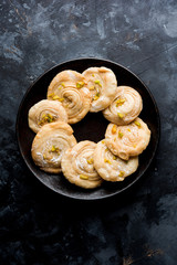 Chirote or Chiroti is a sweet dish from Karnataka and Maharashtra. Served in a plate as a dessert on Festivals or wedding. Selective focus