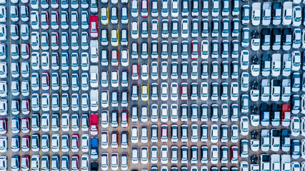 Top view of lot of vehicles at new car parking