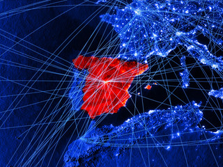 Spain on blue digital map with networks. Concept of international travel, communication and technology.