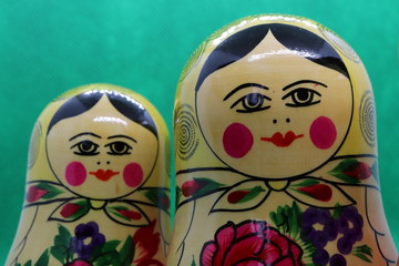 Close up of heads of two Russian dolls