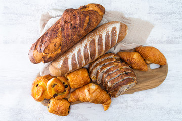 baked French bread on wooden table