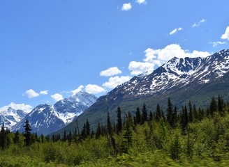 Mountains over rolling hills Alaska