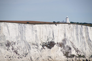 Lighthouse on the white cliffs at Dover
