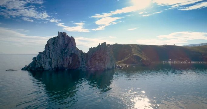 Great Lake Baikal. View of the Baikal A famous tourist site Cape Burhan. Siberia, Russia, 4K drone aerial footage