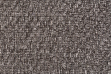 The texture of gray fabric textile upholstery of furniture.