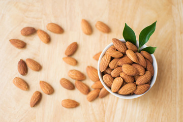 almond on wooden table. soft focus.