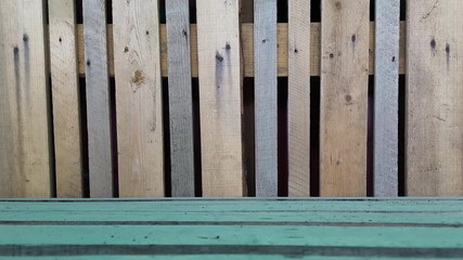 old wooden fence made of narrow planks