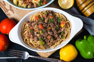 Beef spaghetti,There are plenty of tomatoes and chopped beef on it.