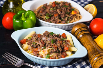 Beef spaghetti,There are plenty of tomatoes and chopped beef on it.