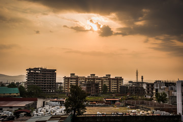 Buildings In The City At Sunset