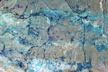 natural mineral grey stone with blue streaks as texture or background