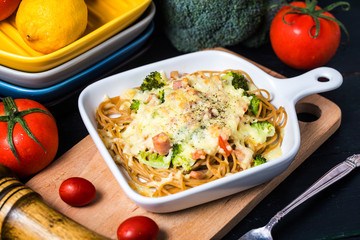 Homemade pasta bake with ham and cheese