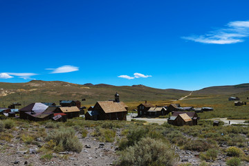 Fototapeta na wymiar Abandoned houses in the desert after the gold rush, Bodie, Ghost Town, California